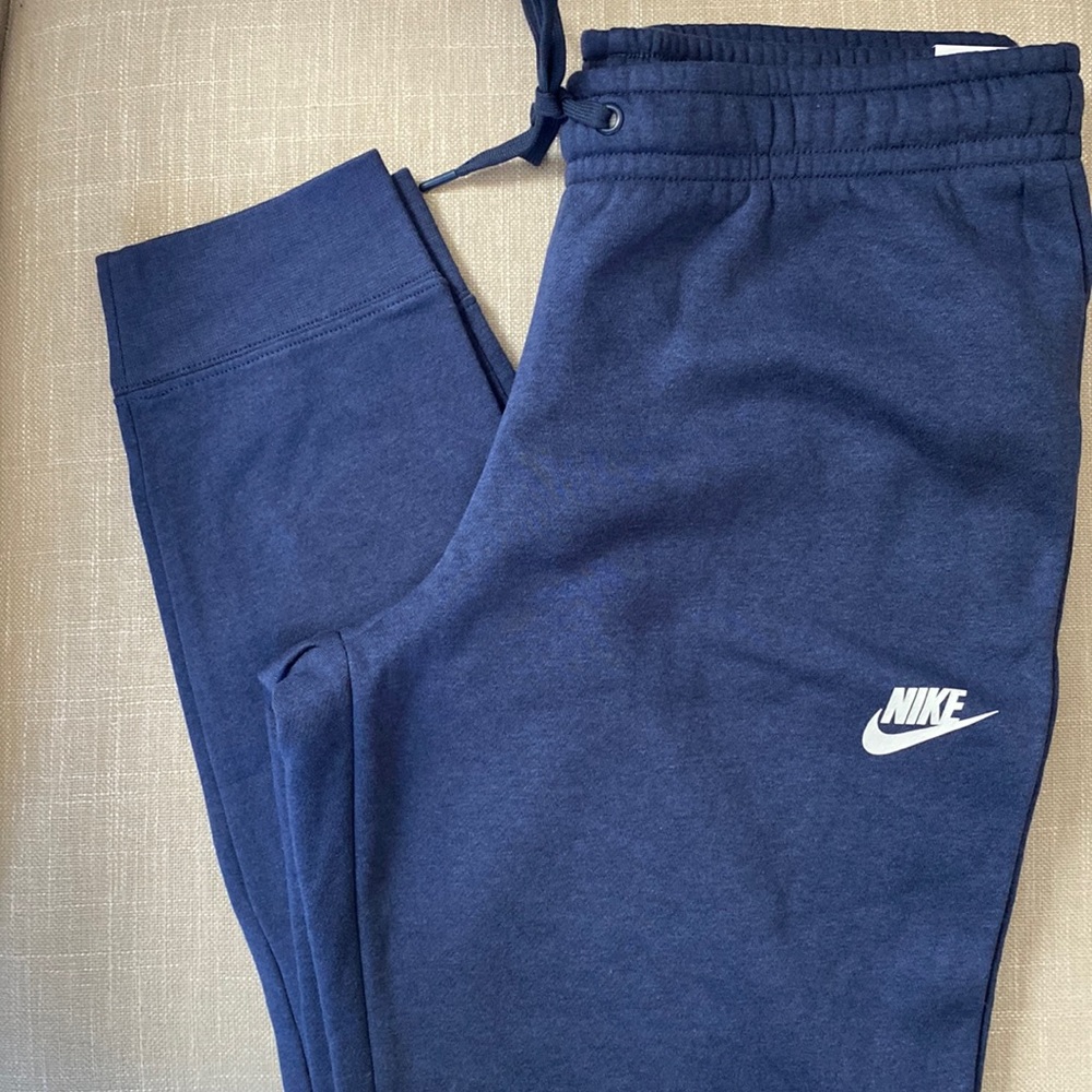 Women’s Nike Slim Fit Mid-Rise navy joggers. Size medium.